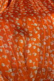 Very pretty dress. Flowy and I like the little gold detail you can only see in person. Feels weightless. - Maria S.