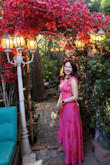 This is a beautiful dress! It is a bit long but I'm a bit short (5'2), so it's expected. It's a little loose fitting, but it looks beautiful and flowy. I'll be wearing this for my 30th bday/graduation party. The color is as beautiful in person! - Alma G.