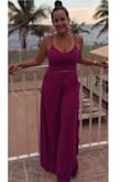 My favorite Lulus outfit yet and sexy! It's true to size. It was not tight or uncomfortable. I was able to wear top without a bra and never had a slip or need to tuck or pull up on it. I wore 4.5" heeled wedges and never stepped or tripped on the pants, but beware they are slit open all the way up so when you sit your entire leg is exposed all the way up to your hip. Matched with some Lulus accessories and had the perfect beach wedding outfit. SEXY SET...Plenty compliments! - Arlene M.