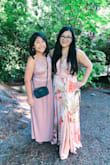 This dress was super gorgeous and quality was amazing. Due to my short stature I did have to have the dress hemmed and I also had them open up the slit/vent a little because I am so short. Appreciative of the adjustable straps it has and the tie waist. The dress definitely stood out among the sea of dark colored gals at the spring/summer wedding I attended. I paired the dress with blush pink heels, and a pink lace bralette to help make it a little more modest in the chest area so that my conservative relatives don't have a heart attack. Felt gorgeous all day long. The only con I can think of was the tie waist part kept coming undone because the material is so smooth and slick. - Tera S.