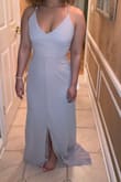 This is my bridesmaids dress for my sister's wedding in August, and it fit me perfectly. I have to get it hemmed because I am 4'10" but other than that I am really happy with the fit from top to bottom. - Mia S.