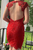 I'm 15 and i ordered this dress in an XS and it fits perfectly, a small probably would have fit too honestly. I always buy smalls or extra smalls, so whatever size you usually get in dresses, order that. The material is really nice, and the back is my favorite part it looks elegant, but modern at the same time with the body-con style-like fit. The red is even prettier in person. If you're unsure on whether to get it or not, get it. - Kimete H.