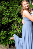 I loved it! The color was beautiful and it fell so nicely! It fit rather well, but I did have to tack the chest area in the center. It was also a bit long, but it did not end up becoming much of an issue. I loved how flowy it was! - Kathleen V.