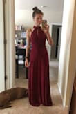 This dress is so versatile! Bought it to wear as the MOH at my best friend's wedding, but I know there will be a thousand more instances where I can wear it. There are so many unique combinations you can create just by restyling the straps to make a new bodice! A bit long for petite gals like me, but a quick hem isn't a problem at all. - Mabel N.