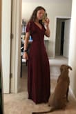This dress is insanely comfortable. It's truly the most comfortable maxi dress I've ever tried on! The inside tie makes me feel super secure, and I appreciate that the skirt is partially lined so it's not see-thru. The sleeves are super cute and fun. The skirt would need a slight hem for petite gals, but that's not a huge problem. - Mabel N.