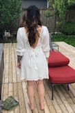 Ordered a bunch of dresses hoping one would work for my boyfriend's graduation and immediately fell in love with this one! It's the perfect mix of conservative yet a little sassy. Don't expect to wear a bra with it...the dress is fully lined though so nothing should show through. Can't wait for another occasion I can wear this dress to! - Alyssa S.