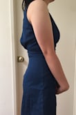 I thought the design was cute, but unlike some of the other dresses I've bought at Lulus, this jean dress did not fit me well at all. The back is super awkward looking because it's too big around the shoulder and upper torso area. There's a lot of extra room and the buttons don't help/have to be altered, so that's why the back sticks out weird the way it does in the photos. It was clearly not designed for petite people with small shoulders, so if you are 5 feet 0 inches like me, keep this in mind. Kind of disappointed to be paying $60 and then having to alter it for another $15. - Amy T.