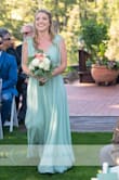 I bought this for a bridesmaid dress, and the color and fit are perfect! Very well constructed and I love the low back. There's also some adhesive on the shoulders that prevents it from slipping. It is pretty cleavage city, so I will need to pin the bust for a bit more modesty and obviously get it hemmed (short girl problems). - Emily B.
