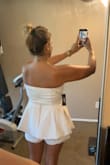 I ordered this in a medium and had to return it for a bigger size. It does run very small so I would recommend sizing up 1-2 sizes due to the fact there is zero stretch to this. Always easier to take it in than have it run too small. The bottom part does run a little short as well which is why I went with the XL instead of the L for more length and coverage. Wearing it for my bachelorette party! Can't wait! - Amy H.