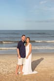 This dress was so perfect for our casual beach wedding! It was a little long (to be expected since I'm 5'2'') and a tiiiiiiny bit gappy in the bust - I didn't have it altered and I still felt beautiful and comfortable. The back was lovely - the side view in my pic doesn't give it enough credit. And the slit was high enough for me to move and breathe, but not so high as to be overly risque. Would highly rec!! - Shelby F.