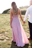 This dress was exactly what I was looking for for my engagement photos. I sized down after reading other reviews and it fit perfectly! - Caitlin M.