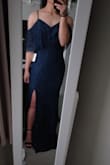 I'm really short, so I do need to get it hemmed a little bit, but I expected that haha. Dress fit just right as it hugged my hips but it was still loose enough, especially around my stomach, so I can move around and not have to worry about it being too tight that everything shows (if you know what I mean). Besides the amazing dress, customer service was impeccable. I have shopped online many times on many different sites and Lulus is definitely one of my top favorite customer service departments as I did economy shipping not realizing till after I have paid that 30 business days was the day before my ball, so I emailed Lulus explaining my situation and they replied really fast, and although they said that it had already been shipped out and that they couldn't do anything about it, I received my order within 6 days and found out that IT WAS changed to express shipping. I cannot thank Lulus enough. This was my first time purchasing something from Lulus, and I definitely see myself coming back for another purchase. - Geline F.