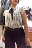 I didn't think twice and bought right away when this blouse was back in stock! Fits amazing, feel comfortable and fresh and it's so cute. You can combine this look with a high rise trousers and belt. Love the detail of a tie. I ordered size Small. - Scarlette H.