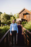 I wore this dress for my engagement pics. Looking back, I would have ordered a Small (straps are adjustable and runs a bit large). It's also very flowy in the mid section, so Small would have worked. It does make my boobs look super small in this dress (I even had a strapless bra)! The material is well worth the cost of the dress.
Oh and also- pain in the butt to put on (the straps get confusing, and getting my finance to put this on was also a pain lol). There would be no way to get this on solo, definitely would need some help. I think I would have worn something else that was easier to put on/take off in my opinion! - Arti P.