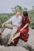 I looove this dress! I have it in 2 colors and will definitely be getting more! I'm short, so I did have to get it hemmed a few inches so it wouldn't drag. I wore this dress for engagement photos and got so many compliments! It can be dressed up and worn casually. I have a bigger bust so the button clamp was a blessing. I can wear a small, but preferred the medium for a more looser look. - Julia J.