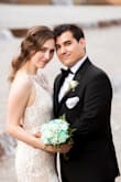 The length and fit was perfect. A little snug through thighs but was as it should be for a mermaid style. The beige lining and material was nice and cool for our May humid wedding in Texas. Photographs beautifully! - Kristin M.