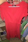 I love this dress! It does show some cleavage if you have a bigger chest, but it's super cute, comfortable, and perfect as a wedding guest! The color is pretty vibrant, but it's great for summer. - Leah K.