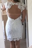 I bought this dress for my engagement party. It's amazing. Modest in the front and sexy in the back. Fit flawlessly. I love it! Just need to clean up some tan lines.. - BRITTANY C.