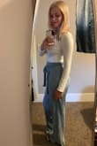 I felt flashy but comfortable wearing these pants to a midweek dinner with the boyfriend. He loved how they looked on me. They're loose but still flattering! They're a little heavy so I don't think I could wear them in the summer heat, but moderate to cool weather would be perfect. They're long, so heels are a must or tailoring them up a little! - Amelia L.