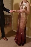 It fit a little loosely. I'm 5'4" 100lbs and got the xs. It was also very long so I had to get really high heels. I loved the color and overall style. Received lots of compliments! - Andrea A.