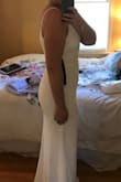 This dress gives an excellent coke bottle shape! Photos don't do it justice. I'm pretty small chested for my size, so I definitely don't need a bra (but I could wear a strapless one). I have an amazing ball gown for my wedding, but I really wanted something to feel sexy and fun in for the reception. This dress fits the bill. I definitely have some lumps, so I will be wearing shapewear, but the dress is well lined and I'm not worried about it showing. Love this dress! - Lillian J.