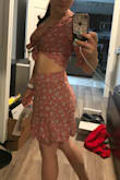This two piece fit like a glove. The skirt wasn't too tight and it fit about my knee. The material is on the thinner side but not see through. I like that the top ties at the front so it provides a snug feel. - Maries A.