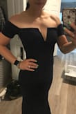 I had low expectations for this dress since I was buying it online. But holy smokes! It exceeded all my expectations! The material is thick, slimming, and doesn't show any marks underneath. It fit perfectly, with the beautiful shoulder cut. - Maries A.