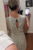 I don't like to wear pants, so I wear a lot of dresses but it can make me seem "dressed up." This dress is perfect for a hangout with friends that doesn't make me look out of place. It's a nice cotton or linen material but that does come with a downside - after washing it needs some attention with the iron. The picture is after washing without ironing. The back is so cute with the peek-a-boo opening. The color, texture and feel of this dress is exactly what I wanted for the summer.. Oh! and POCKETS! - Annastasia R.