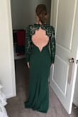The dress is definitely meant for a 5"10" model so I will have to have it hemmed but otherwise it fits beautifully. I can't wait to wear it to a wedding this fall. - Elaine S.