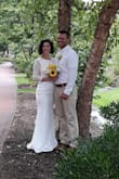 I overlooked this one because I mistakenly thought it didn't have a wow factor right away, but when I clicked the link and clicked through the reviews I fell in love! This dress was perfect for my courthouse wedding. I felt so beautiful and received many compliments on my dress. I'm still so in love.
One thing I'll mention is the material under the lace did bunch up and looked bumpy in a couple photos but you can smooth it out pretty easy - I didn't notice it in a couple. My husband kept stepping on the small train so I have to wash it.
10 star dress! - Rachael V.