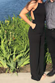 This is the comfiest jumpsuit I've ever experienced. The fabric is great and doesn't wrinkle! The legs are a little long, but I wore heels and it worked out perfectly. Fits great and feels great! I also wore nipple tape since it's showy in the girlies region on the side. Wish I could have this in every color! - Sara W.