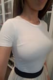 Definitely a cute crop that can go with everything, but if you aren't layering on top of it, beware that the material is on the thinner side (bra cup lines show). I usually wear XS in tops from Lulus but this one has no give. - Angel K.