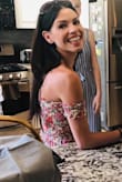 I'm very petite but this dress is so perfect. Hugs my top half and stays put so I don't have to pull it up every 5 minutes. Super comfortable and beautiful bright colors! Wore it on vacation and to my engagement party. - Katie B.