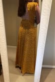 Love this dress! Slips on and off easily, very comfy. Fits a little tight but would not change sizes. I do usually wear a large so I had to go up a size due to my boobs being a DD. - Paxton B.