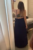 I ordered this in navy for a beach wedding in attending in Hawaii. The fabric is more cloth than I expected but I love the fit. I'm usually between a medium and a large in Lulus dresses and I wanted this to be loose and flowy so I sized up! The elastic band is really comfortable which I think makes this dress great for a lot of body types - Samantha S.