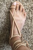 I wear a size 11 so it is always difficult to find really cute shoes that fit. These fit great and are surprisingly comfortable. I do have to wrap the strap through the straps that cross over the feet before wrapping them around my ankles to make them more secure over my foot but I have really skinny feet so not sure if that is why or if they are made too loose? But they still look really cute and fit well when I do that so no big deal for me! I love these! *The first picture shows how loose they are when wrapped the correct way, the second picture shows how they are when I wrap the strap through them. They still look great and fit securely when I do that* (ignore my nasty toenails lol!) - Destiny W.