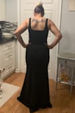 I bought this for an upcoming wedding. It fits like a glove and hugs all the right places. It is long so I will be wearing a heel with it. - Stephanie L.
