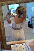 Free People. I just love this brand. This top is so pretty! The colors are so vibrant! Originally I ordered a size Small, but it was way too big. I then ordered an X-Small which fit so much better! (It is still a little loose, but I don't think there's xx-Small and I doubt that would fit me!) The crochet detailing on the bottom of the shirt is gorgeous and gives it a lovely "flare." I haven't worn it out yet but luckily the summer weather is here so hopefully soon! Totally worth the price; highly recommend if you love crop tops!! :) - Emily R.