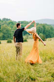 I bought this dress for our engagement pictures, and I basically haven't taken it off since. It's AMAZING! You can go bra-less and don't need any kind of sticky bra/cover, and it's so so incredibly flattering. Selfishly I don't want to rate the dress because I don't want anyone else to have it :) - Stephanie W.
