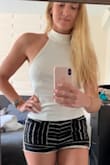 The white top is super cute and comfy. One thing is that you can see a little through it so you have to wear something to hide your breasts.
The quality is good and you have a second button coming with the label. - Jaquelyn D.