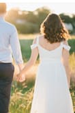 I wore this dress to my engagement pictures and absolutely loved it! It is a little bit big in the top area, but I ended up getting the straps altered and it fit perfectly. I received a lot of compliments on it and loved the way it looked on me! - Sara K.