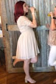 I was searching for a very specific color scheme for a bridal shower and this dress was it! Fit nicely around my hips and chest. Skirt is not too short and is so flowy and magical. I felt like a princess all day. - Leah B.