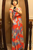I initially purchased M and was so excited but had to exchange it for L - my shoulders are too broad for M. If you are in between sizes because of the shoulder width, size up. Gorgeous dress, material, how it flows, how it makes you feel. I will wear it all summer. - Martina Z.