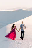 Dress fit perfectly, however the length was a bit long. It was the perfect color for our engagement shoot out in the desert! - Alisa S.