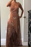 This dress is amazing! I read the reviews before I bought it, and everyone was spot on. This dress flows when you walk and billows! I am short so will definitely need a hem even with heels on. - Jessica B.