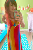 This dress is awesome!! I love that it has a tiny little snap at the bust so that you can leave it open or button it up if you prefer that look, or just want to cover up more. I am super happy I went with the medium,. I chatted with a fit specialist who suggested the medium for my measurements and because the hips are flowy I shouldn't have an issue with my hips- and she was correct! If anything it is actually a tad loose, but I wouldn't change the size. It just makes it more comfortable! It is very flowy great Summer dress, and the colors are very pretty and vibrant. I love rainbow everything, so I knew I had to have it- and I'm super happy I snagged it on sale! Love it love it, thank you!! - Alyssa M.