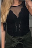 I'm so excited to wear this for a night out! Just have to wear a thinner strapped bra so it won't show. It's soft and has two button snaps at bottom to not ride up and is really cute! - Nina E.