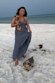 I purchased this dress for a photo shoot at Pensacola Beach. The photos are from cell phone shots while we were waiting. It was hot and the dress traps in the heat so I wish there was a slit as I kept hiking up the dress, but I think it worked out well. I haven't seen the photos from the shoot yet. I am 5'3 and I think I could have gotten away with wearing wedges without the dress dragging the ground. I tied the top in a halter like the other reviews suggested and it worked out perfectly. I'm between a B/C cup and the top fit perfectly for me. - Bo M.