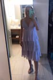 I ordered this dress for a summer wedding and I love it! It fits like a glove besides the top- wish it had cups. I'm flat chested but the adjustable straps helped fix this problem. I highly recommend this dress!! - Camryn D.