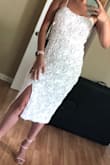 Ok so first of all I NEVER buy online clothes, but I had to give it a try ! I was trying to find something for my court wedding which was at my house and literally I spent THE ENTIRE DAY with my mother in law and one of my maids looking for the dress in every mall and store I found. After 10 hours and a week before the wedding I was tired of trying so many dresses and styles. My friend told me to try to find something on Lulus (which I was skeptical because if my first time buying a dress online), so I read the reviews. I saw that some of them said that to buy it one size smaller, so I did that. I am usually an M, but I purchased it in a S. The dress arrived on Wednesday (my wedding was on Saturday). First of all the fabric is really good. It's not hard or too delicate. I tried it on and it was perfect! I wore it on my special day and everyone gave me compliments about it. I couldn't believe that I could find my dress online and just in the comfort of my house! I'll be buying more in the future like for my bachelorette party and for all my special days!! - Paola C.